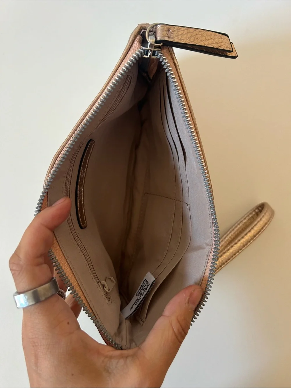 Nine West Metallic Rose Gold Wristlet